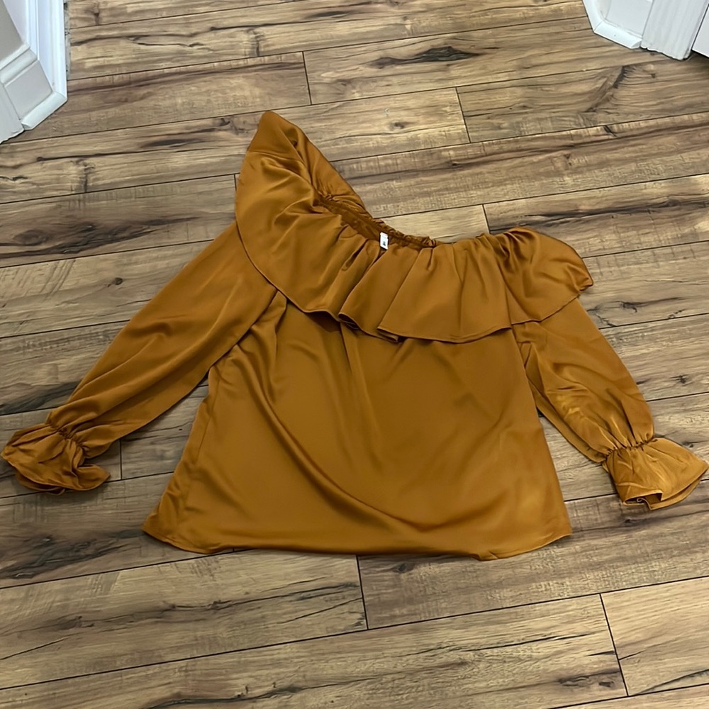 Glam gold one shoulder ruffle top